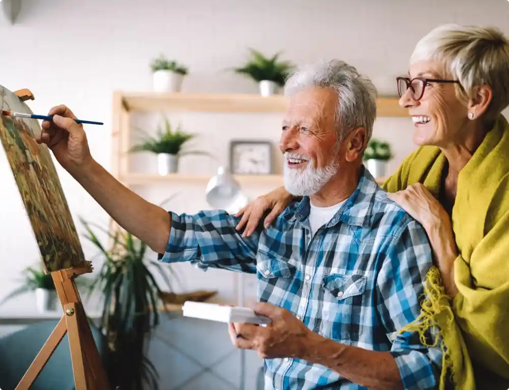 Senior couple painting